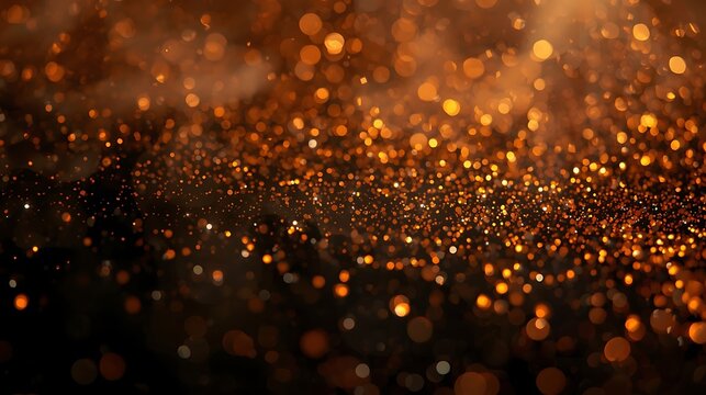Abstract background with golden bokeh lights blurred shiny sparkles and dust texture elegant and festive backdrop for decoration or celebration