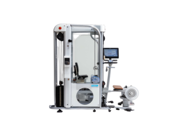 Modern white exercise machine with a seat, display, and various functional components