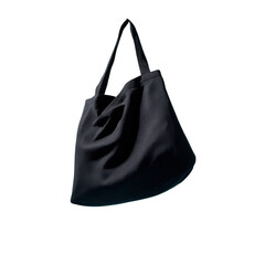 a plain black fabric tote bag floating in mid-air against a clean light blue background, shaped naturally as if being worn over the shoulder by an invisible person.
