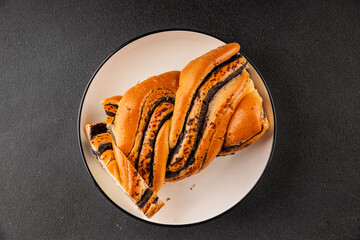 poppy seed roll braided poppy seed brioche sweet pastry dessert poppy seed roll tasty snack fresh gourmet food table setting rustic food top view copy space