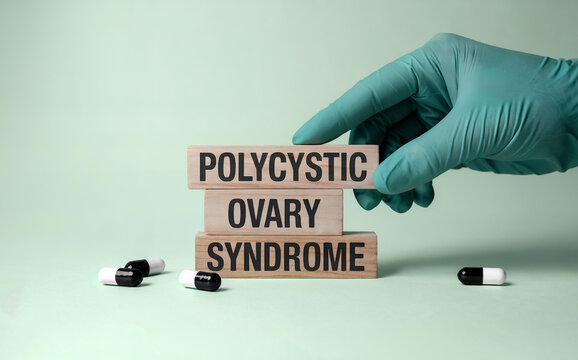 Polycystic Ovary Syndrome PCOS Medical Concept on Wooden Blocks