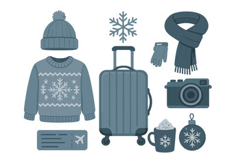 Flat lay of winter travel essentials including warm clothing, suitcase, camera, and holiday accessories