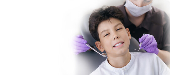 Banner Healthcare orthodontics for teeth of Child. Caucasian boy child with dentist in dental clinic