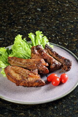 Pork Ribs with Miso: cup of miso, sugar, water, mirin sake, pork ribs, oil, chopped onion, chopped garlic clove, teaspoon of ginger, and chopped scallions.