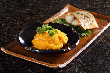 Kabocha puree made with Japanese kabocha pumpkin, olive oil, butter, salt to taste, and black pepper to taste.