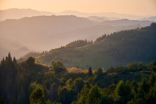 Natural panoramic mountains landscape in sunset. Ukraine, Carpathians, Spinzova Mountain.
