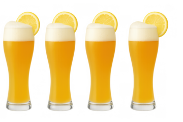 Four tall glasses of cold wheat beer, weissbier, or hefeweizen with white foam and a sliced lemon garnish on a transparent background