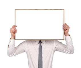 Young businessman showing empty board