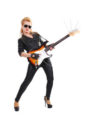 Rocker girl in a leather jacket expressively plays the guitar.