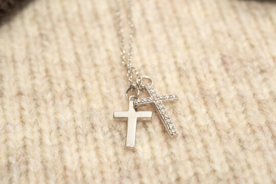 The cross-shaped necklace is a perfectly designed accessory.