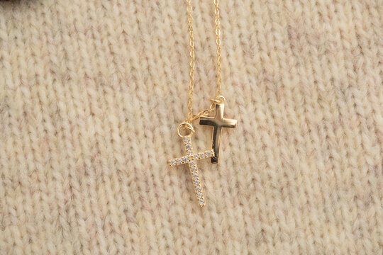 The cross-shaped necklace is a perfectly designed accessory.
