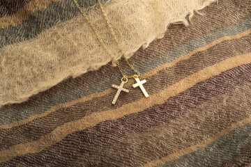 The cross-shaped necklace is a perfectly designed accessory.
