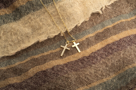 The cross-shaped necklace is a perfectly designed accessory.