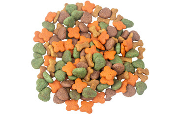Colorful macro pile of dog food isolated on white background for healthy food nutrition.