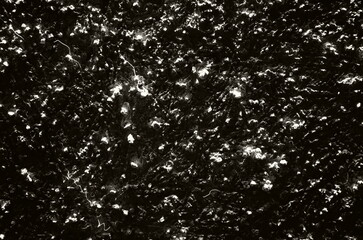 Texture, light, shadow and architecture. Light shower of a wall.