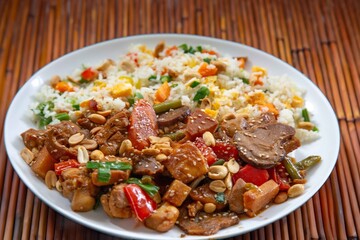 Traditional chicken xadrez with colorful chop suey rice