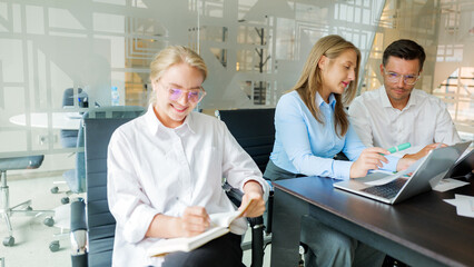 Team collaborates in modern office setting