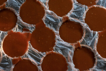 Date Palm Jaggery (Patali Gur) Cooling in Traditional Molds and Plastic Sheets
