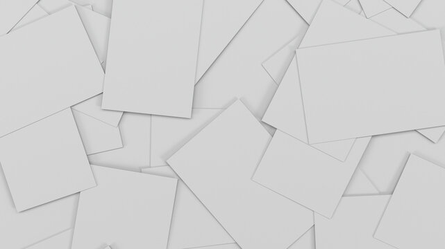 Background texture of scattered blank white business cards.