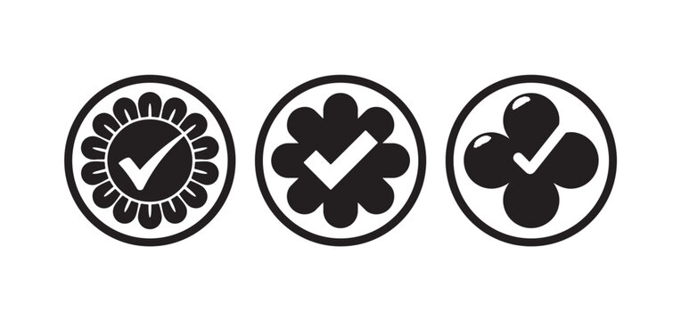 Set of three check marks with decorative flower and clover shapes, modern design elements