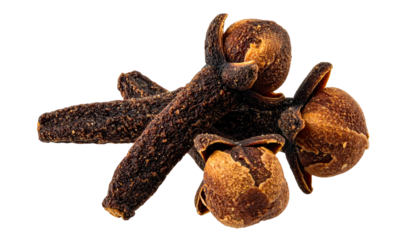Three dried brown cloves, seen close up against a black background