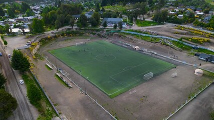 Community Soccer Field in Villa La Angostura, Argentine Patagonia. Sports promotion, social inclusion, and community development,