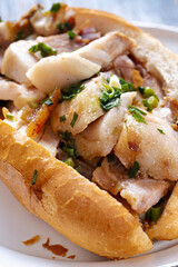 rustic vietnamese roast pork bahn mi sandwich