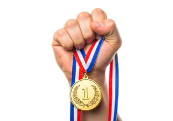 Fist holding up a first place gold medal with red white and blue ribbon isolated on transparent background