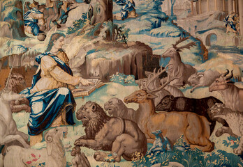 Medieval tapestry of Saint Mammes speaking to animals.