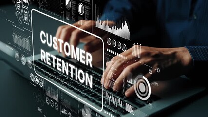 Hands typing on laptop keyboard with overlay graphics related to customer retention and analytics in a modern office setting. Asymptotic smart data analytic. - Powered by Adobe