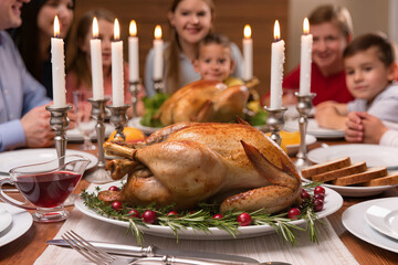 Family gathers around a beautifully prepared turkey dinner during a festive holiday meal celebration Generative AI