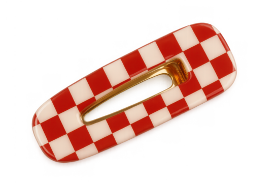 Hair clip featuring red and white checkerboard pattern, a stylish fashion accessory for hair styling and retro looks