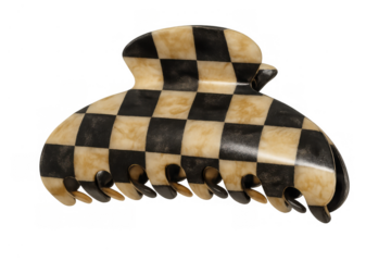 Black and white checkered claw clip, a hair accessory for styling and beauty, on a transparent background