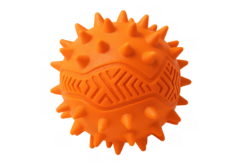 Orange rubber dog toy ball with spikes and patterns, providing stimulation for pet dogs. Transparent background