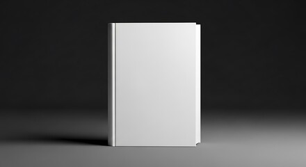 Blank white book standing upright on a dark grey surface, ready for custom design or branding mockup, with ample copy space