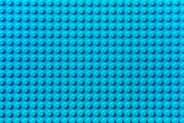 Naklejka premium Turquoise background of the LEGO Classic baseplate