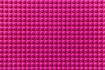 Naklejka premium Lviv, Ukraine - January 4, 2025: Pink background of the LEGO Classic baseplate