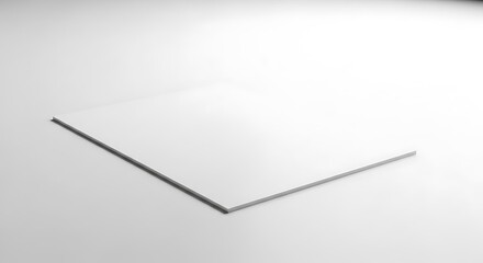 Naklejka premium A simple white paper or card bent at an angle, creating a minimalist abstract shape with a shadow on a white background, isolated on white background