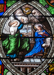 Fototapeta premium Stained glass (19th century) of Annunciation to the Blessed Virgin Mary by the Archangel Gabriel.