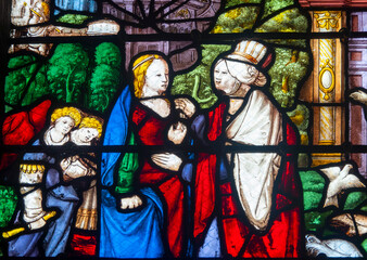 Fototapeta premium Stained glass (19th century) of Visitation of the Virgin Mary to her pregnant cousin Elizabeth.