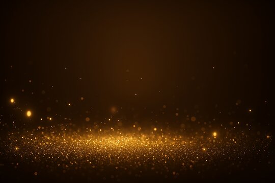Golden sparkling glitter dust background with shimmering particles and warm abstract light effect, perfect for festive design projects