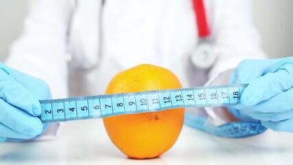 Nutritionist or dietitian at the table