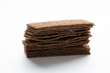 Dry rye crispbreads on a white background
