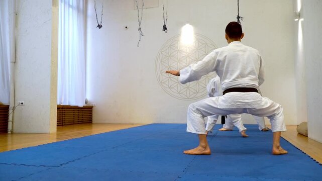 Sportsmen in Kimano are engaged in martial arts