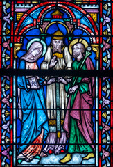 Stained glass (19th century) of Holy family: The wedding of Mary and Joseph.