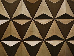 Vintage brown geometrical shapes texture on the city wall