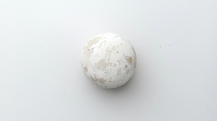 A white sphere with a textured surface.