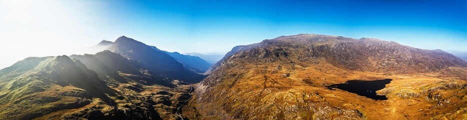 Autumn colours over Llyn Cwmffynnon and Miner’s Track - Start Point, road A4086 from a drone, Pen-y-Pass, Snowdonia, Wales, UK