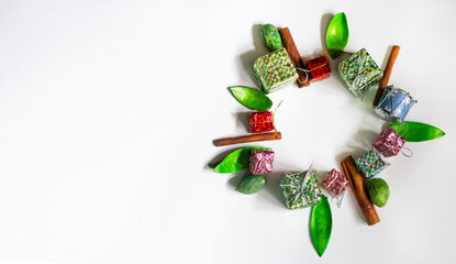 New Year's composition of gifts and various decorations in the form of a wreath. Christmas decor.