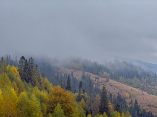 Misty Autumn Rain Clouds over Ukrainian Carpathian Mountains.